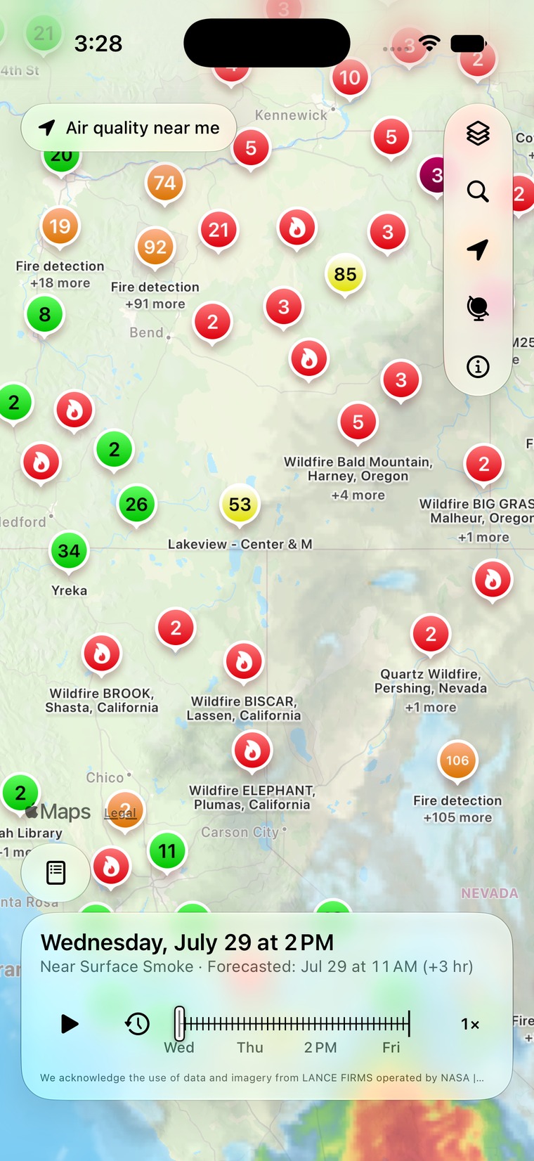 Air Quality Index on iPhone showing the 48-hour near-surface smoke forecast over Oregon, California, and Nevada, with named wildfires, satellite fire detections, and EPA AirNow readings.